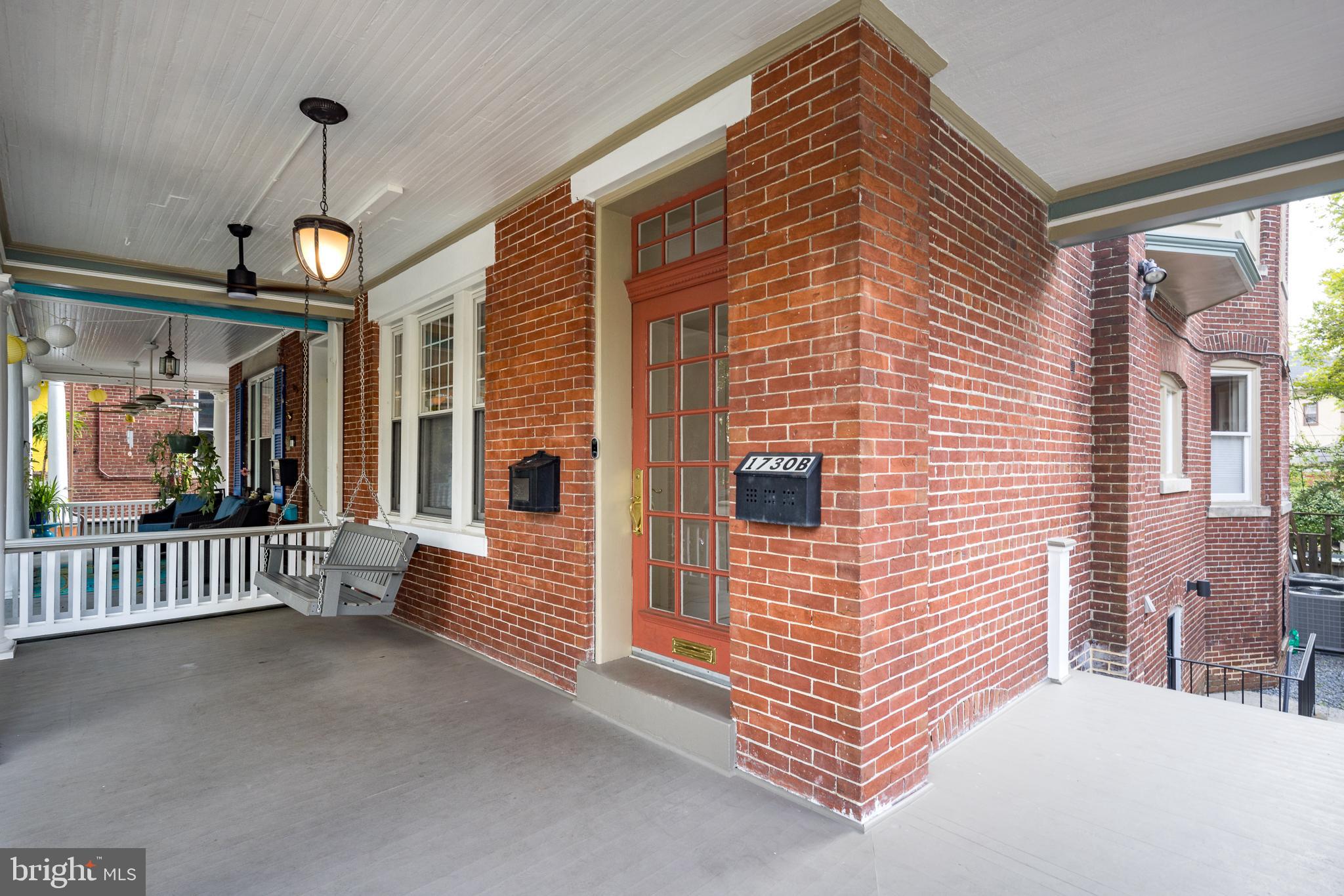 1730 Park Road Northwest Washington, DC 20010 - Photo 48 of 74 Front porch, front door, porch swing, brick