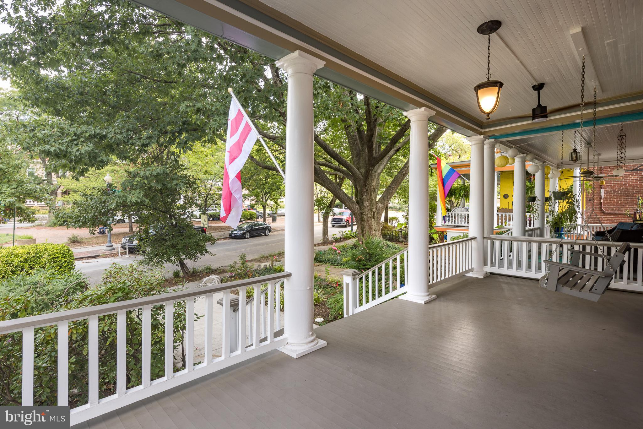1730 Park Road Northwest Washington, DC 20010 - Photo 5 of 74 Front porch, porch swing, dc flag, park road