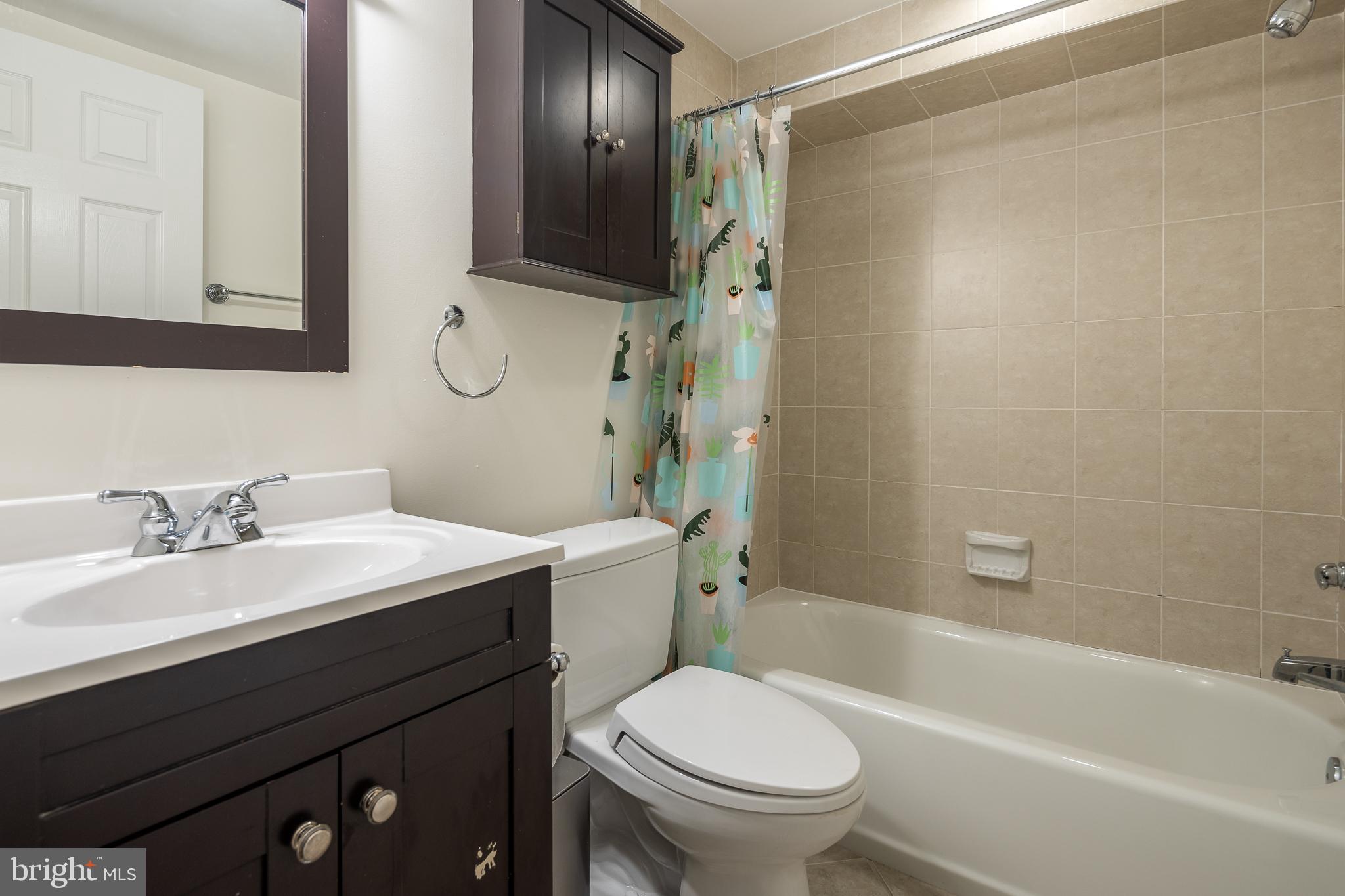 1730 Park Road Northwest Washington, DC 20010 - Photo 56 of 74 bathroom, ceramic tile, tub and shower, renovated