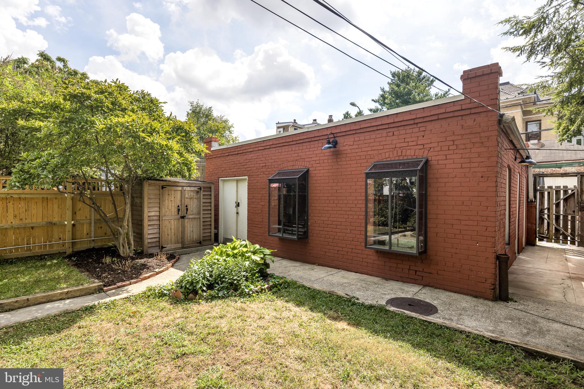 1730 Park Road Northwest Washington, DC 20010 - Photo 66 of 74 Garage, separate brick garage, shed, lawn