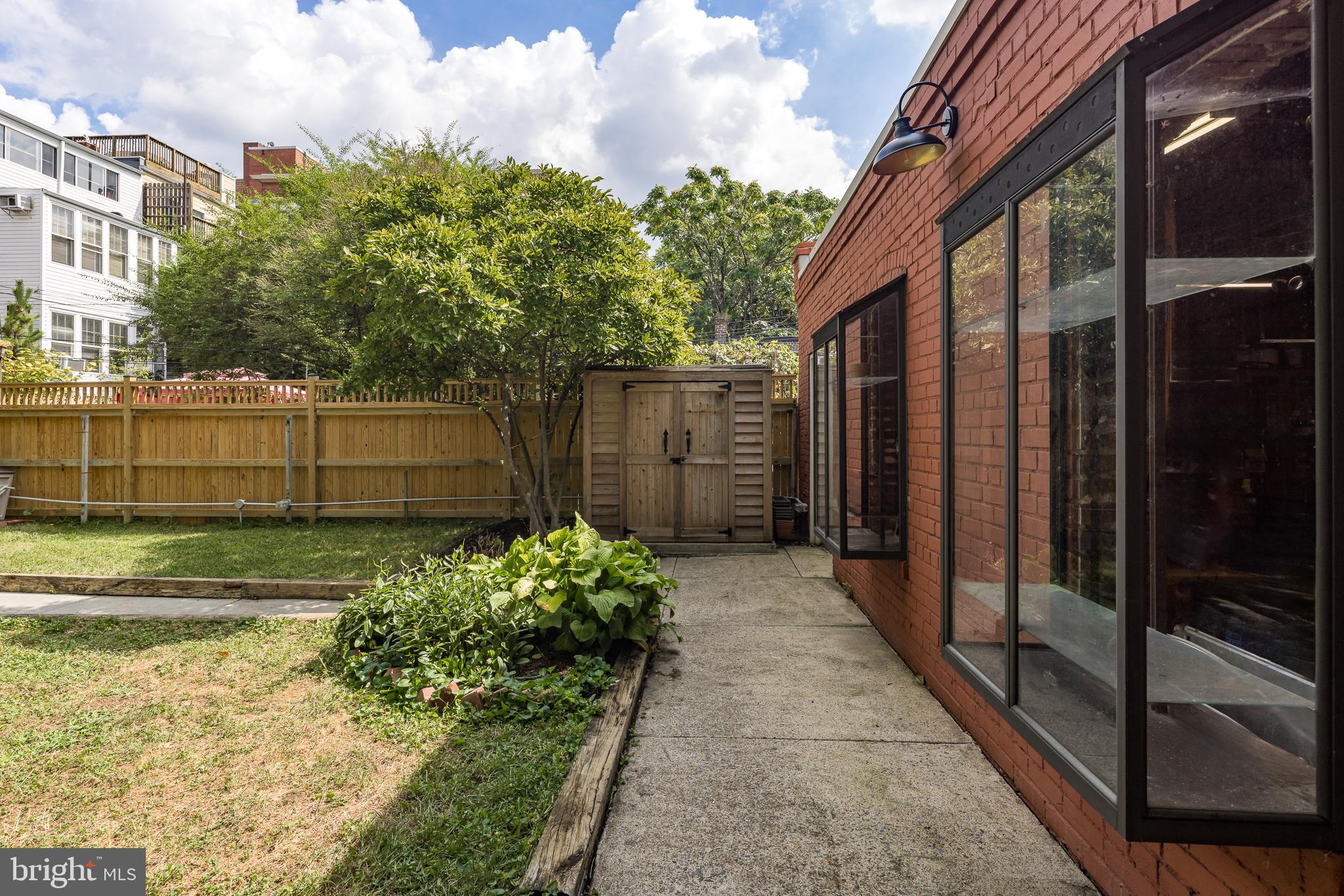 1730 Park Road Northwest Washington, DC 20010 - Photo 67 of 74 Garage, separate brick garage, shed, lawn
