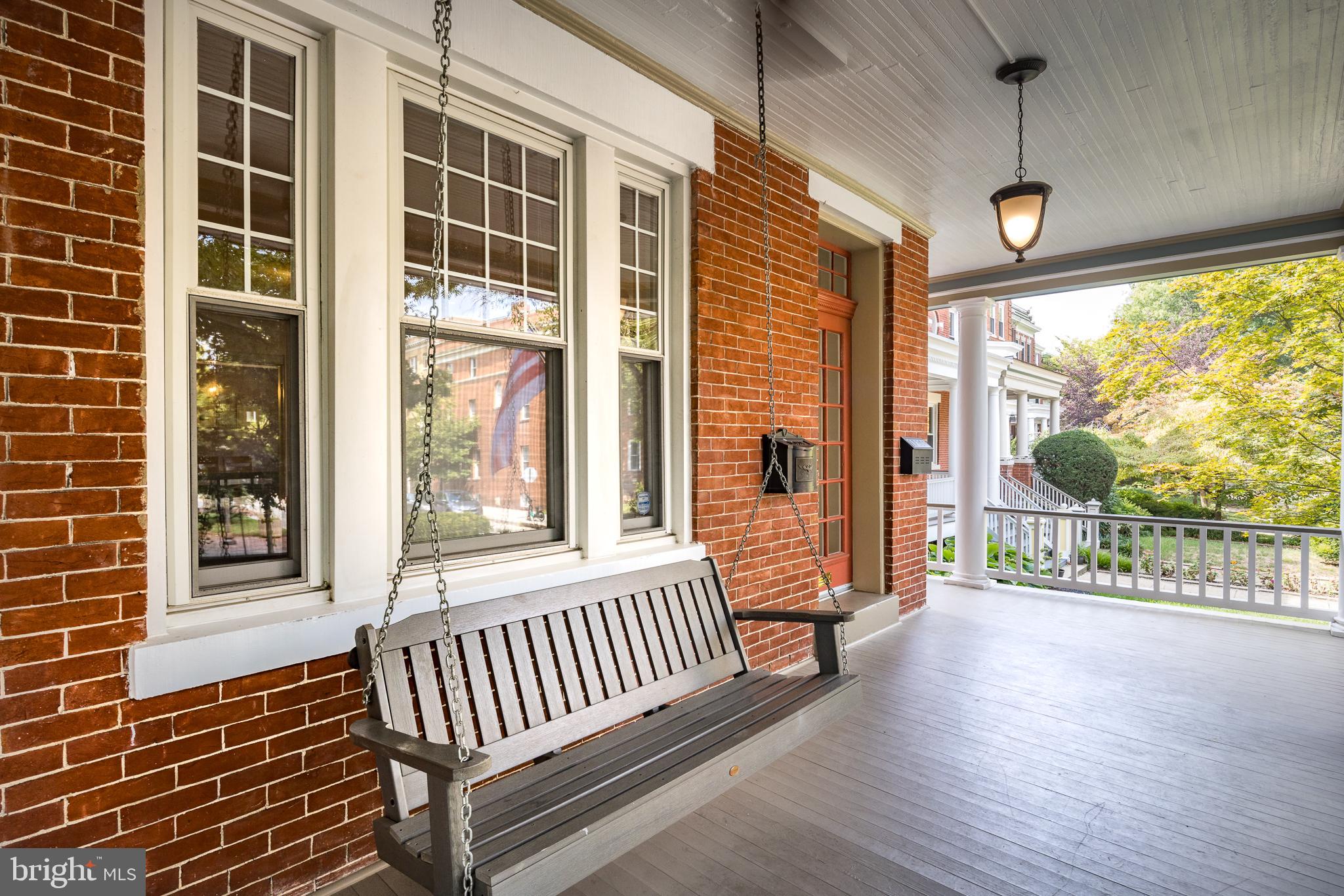1730 Park Road Northwest Washington, DC 20010 - Photo 7 of 74 Brick home, front porch, porch swing,