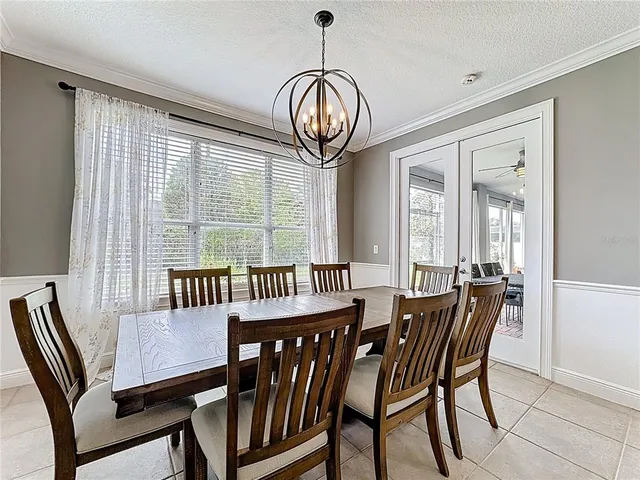 a bedroom with a bed and a book shelf