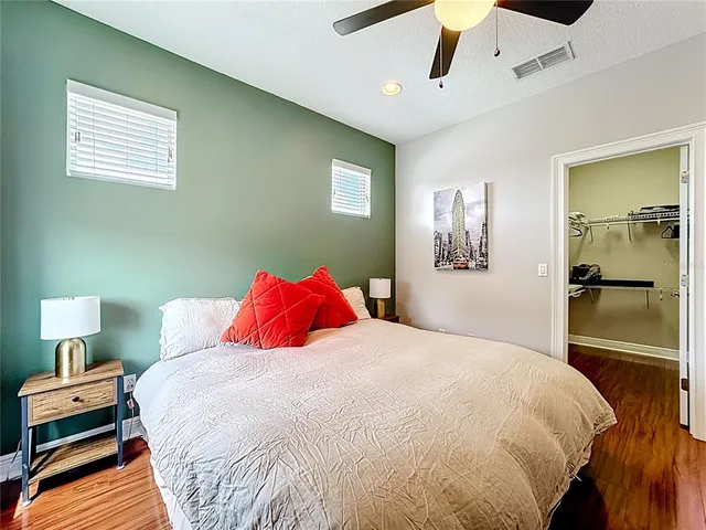 an aerial view of a house with a big yard