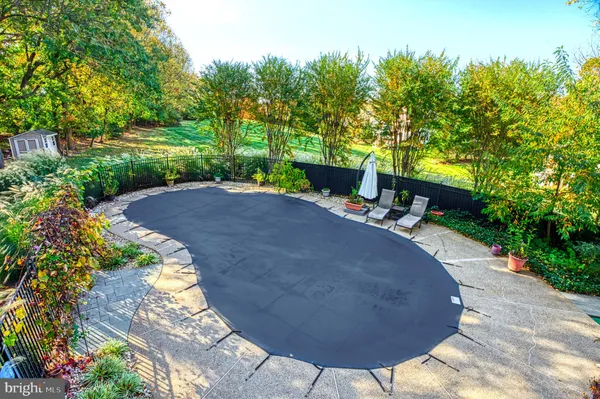 a view of a backyard with a garden