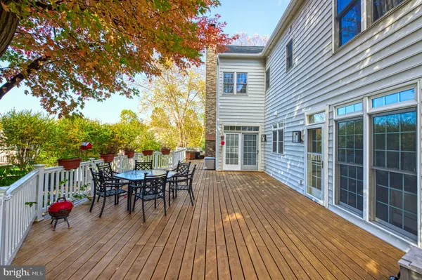 a view of a backyard with sitting area