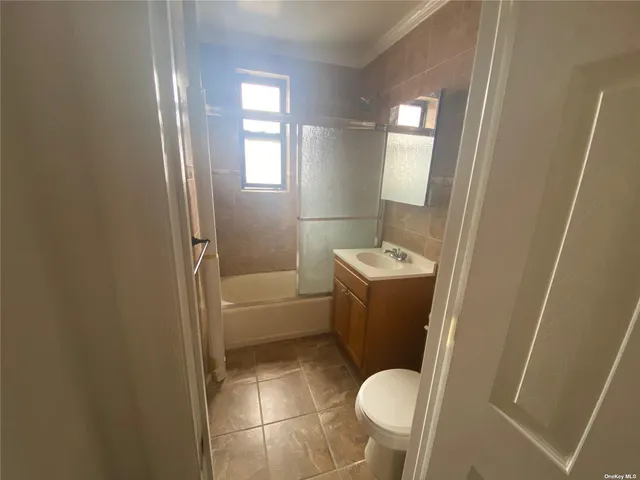 a bathroom with a sink and toilet