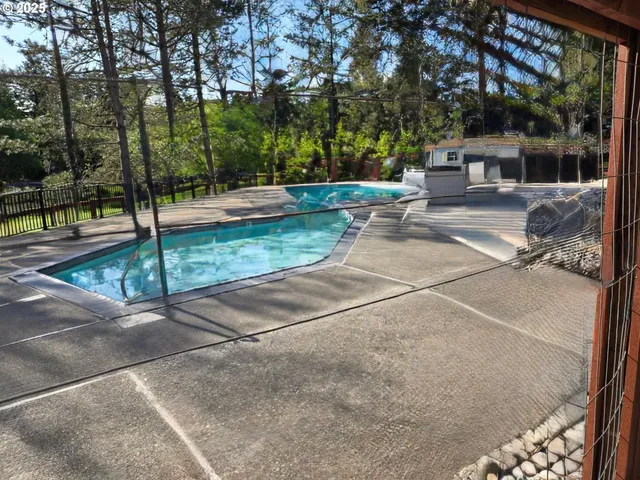a backyard of a house with lots of green space