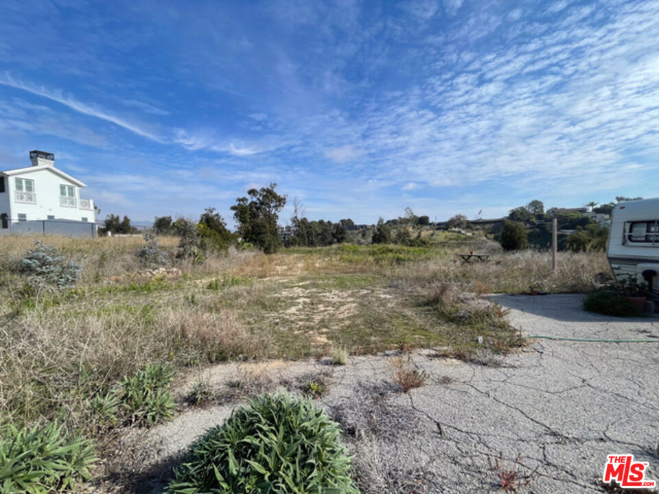 6660 Wandermere Road Malibu, CA 90265 - Photo 11 of 29 a view of a field with an ocean