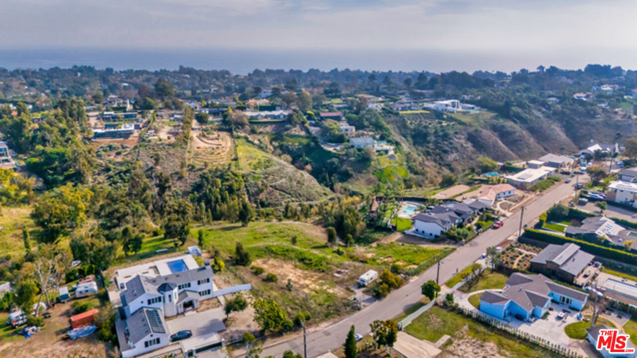 6660 Wandermere Road Malibu, CA 90265 - Photo 23 of 29 an aerial view of a city with lots of residential buildings