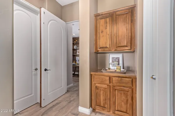 a kitchen with stainless steel appliances a refrigerator and cabinets