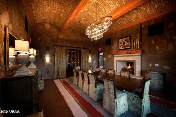 a view of a swimming pool and lounge chairs