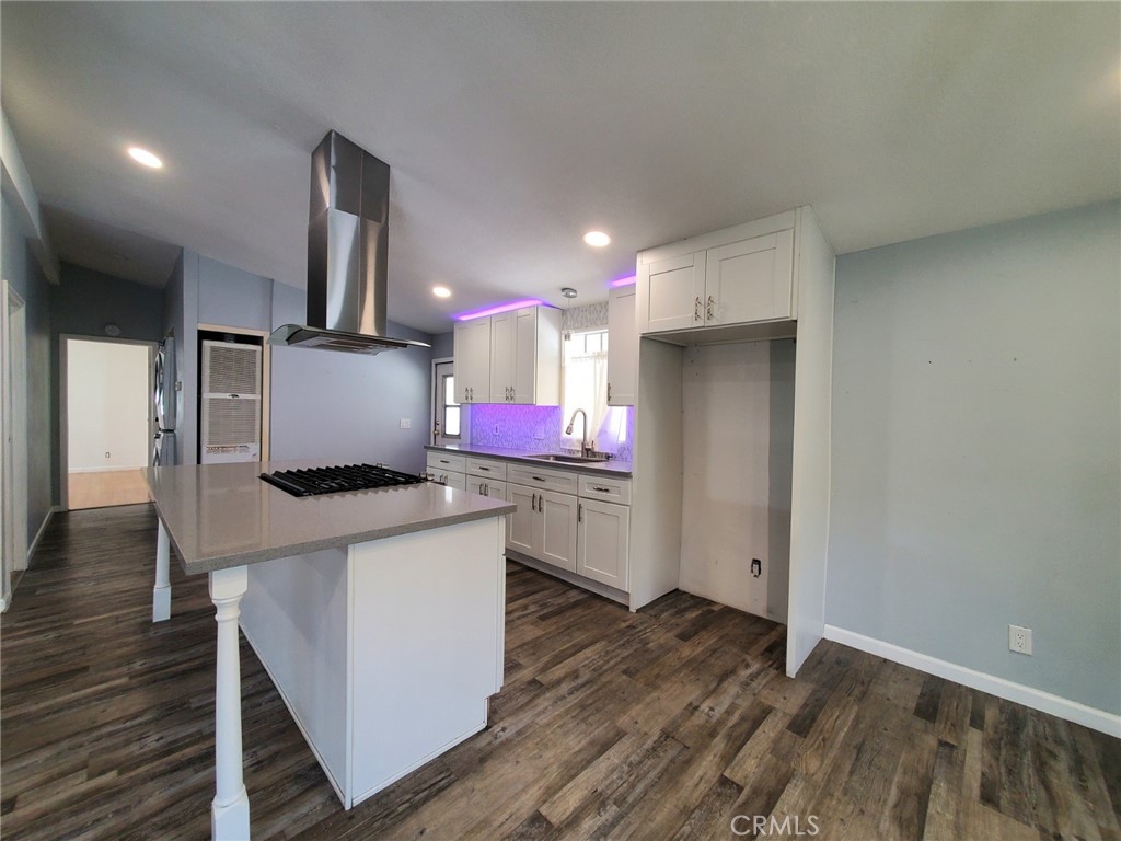 27361 Sierra Highway, Unit 19 Canyon Country, CA 91351 - Photo 13 of 26 a kitchen with stainless steel appliances a refrigerator and a stove