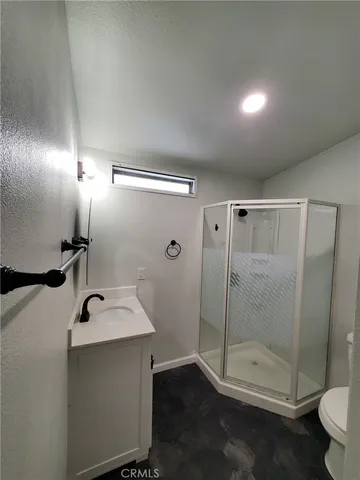 a bathroom with a sink and mirror