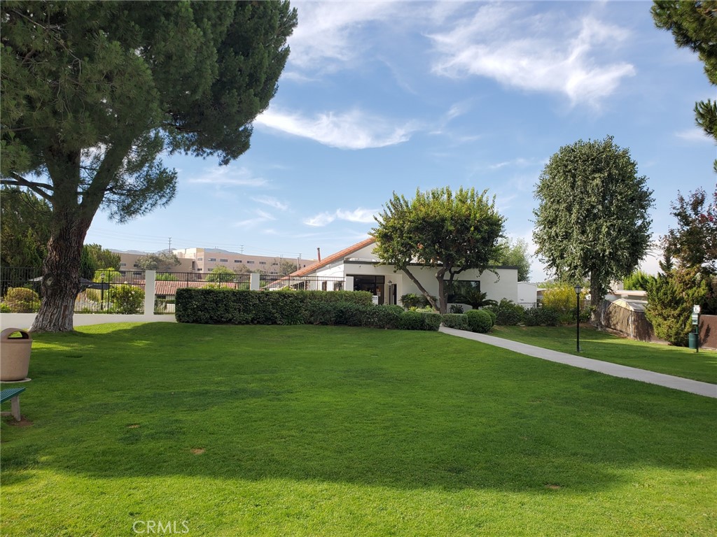 27361 Sierra Highway, Unit 19 Canyon Country, CA 91351 - Photo 23 of 26 a view of a golf course with a garden