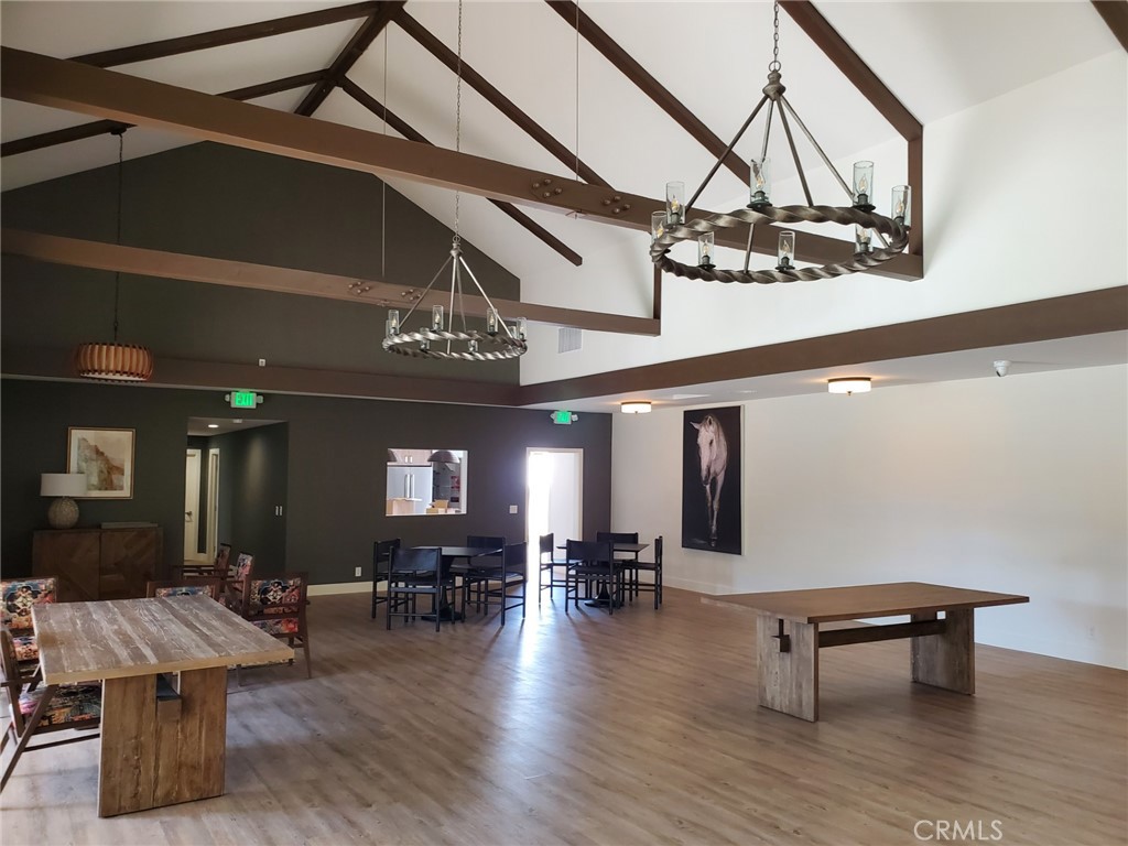 27361 Sierra Highway, Unit 19 Canyon Country, CA 91351 - Photo 24 of 26 a view of a room with furniture and wooden floor