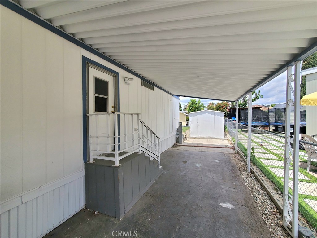 27361 Sierra Highway, Unit 19 Canyon Country, CA 91351 - Photo 7 of 26 a view of a house with a street