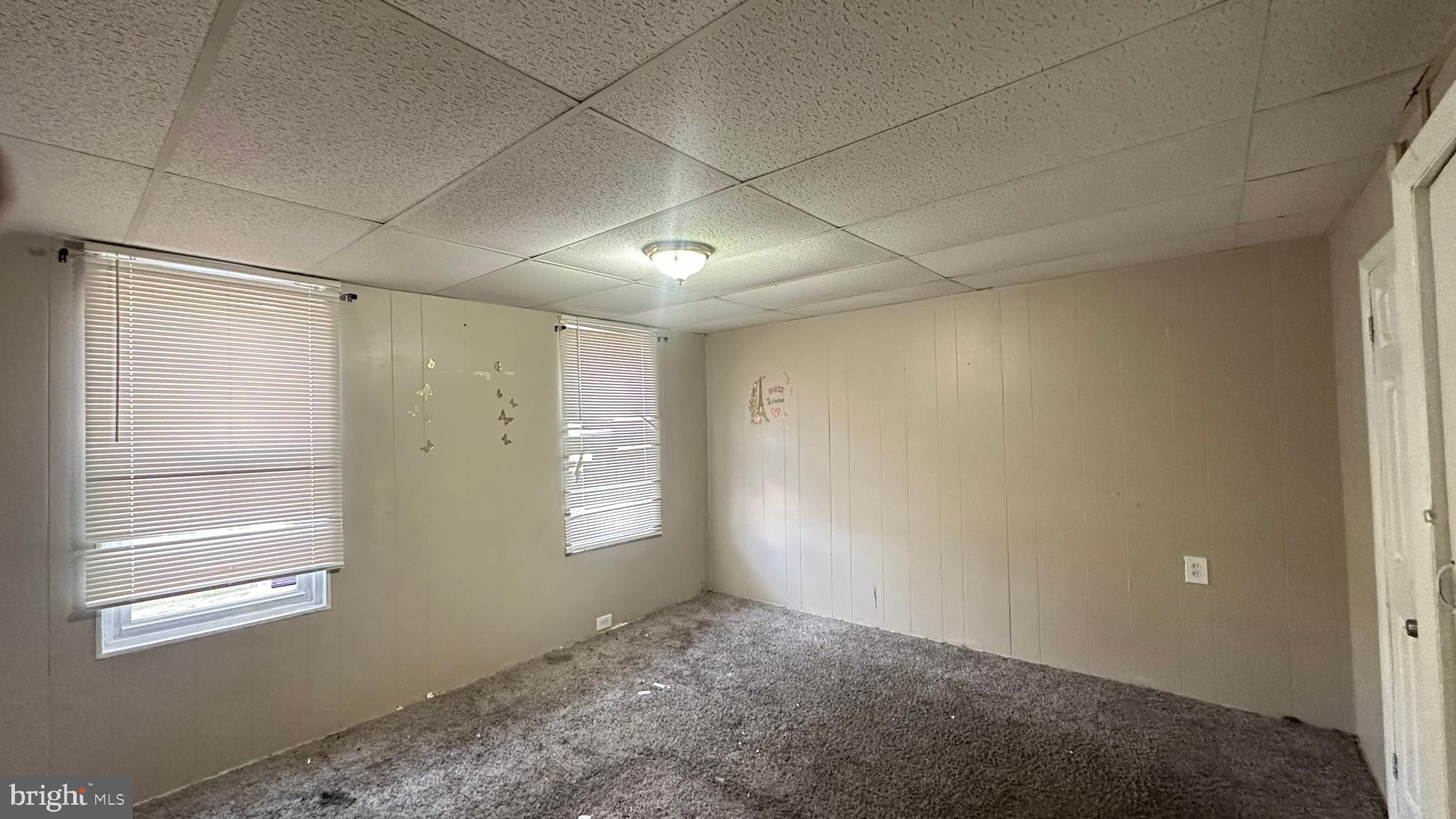 104 South 3rd Street Darby, PA 19023 - Photo 4 of 7 a view of an empty room and window