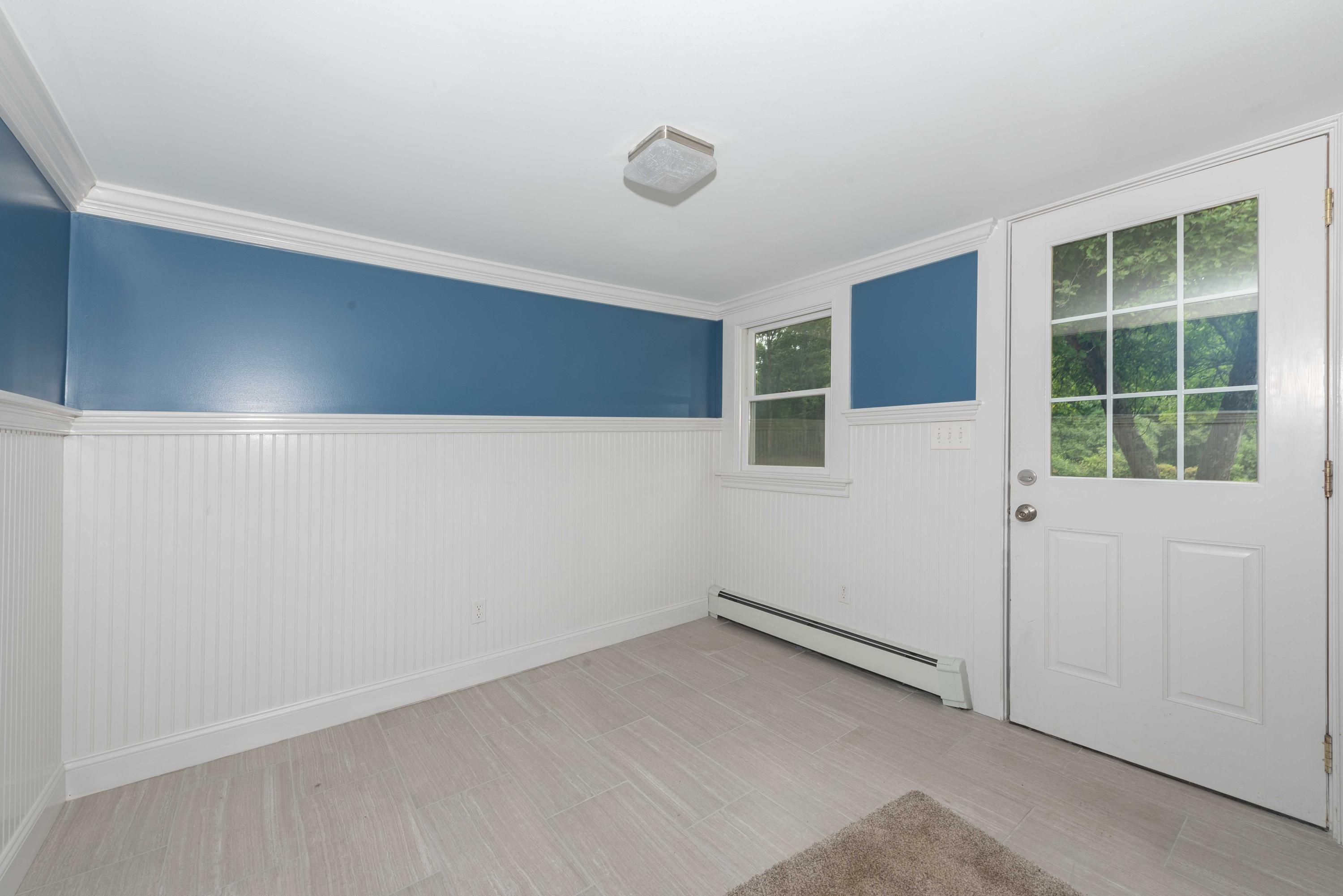 176 Shore Road Bourne, MA 02532 - Photo 23 of 25 an empty room with windows