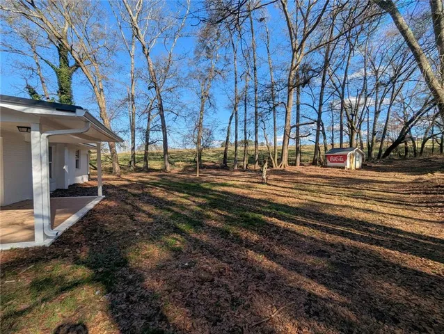 a building with trees in front of it