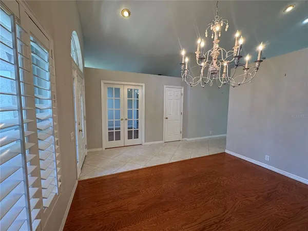 a view of a chandelier in a room with a chandelier