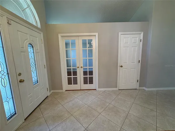 an empty room with windows