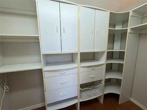 a view of an empty walk in closet