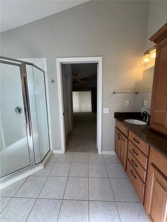 a view of a refrigerator in a kitchen