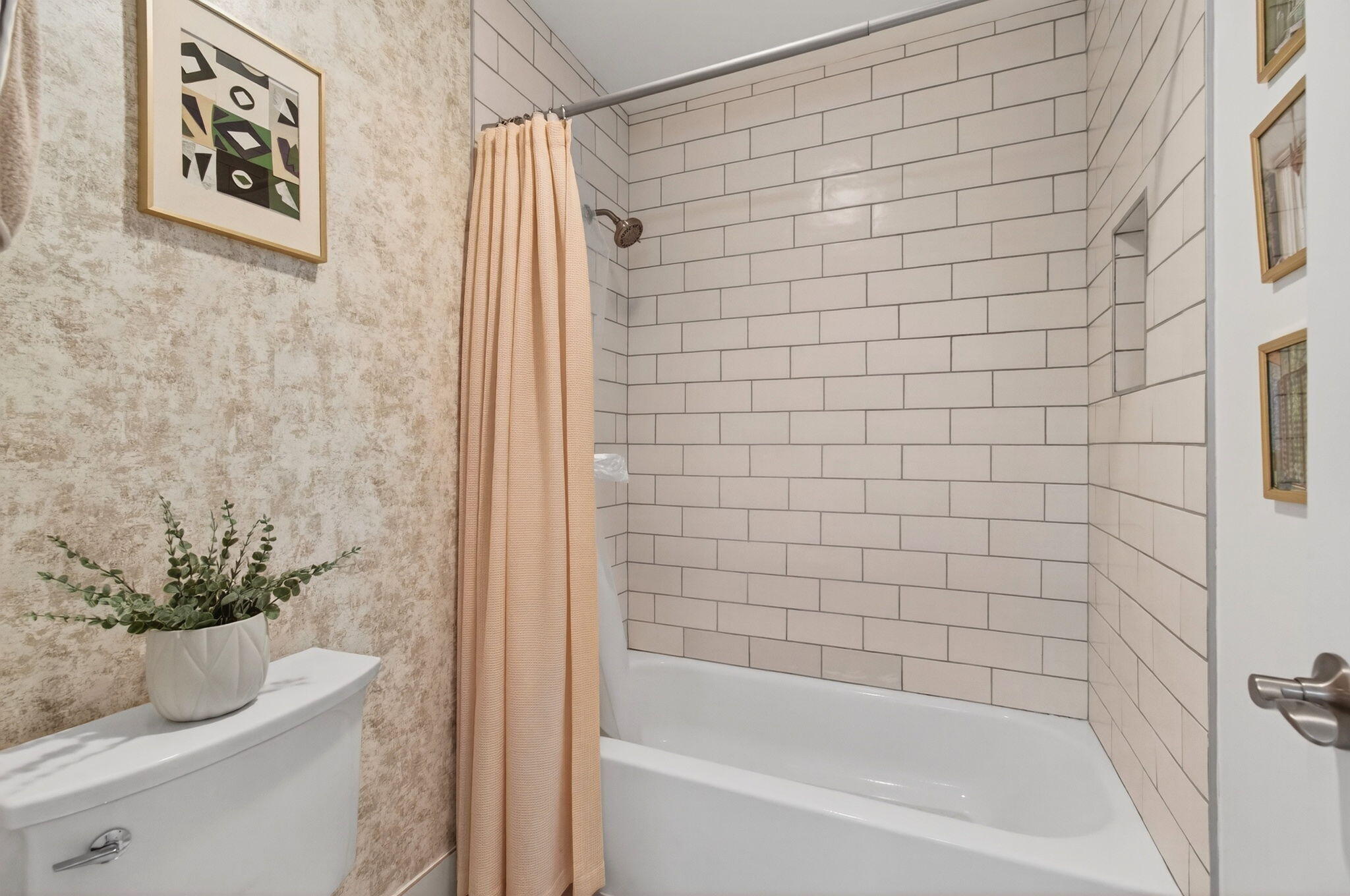 2825 Southwest 13th Street, Unit 204 Delray Beach, FL 33445 - Photo 33 of 62 a bathroom with a shower and a bathtub