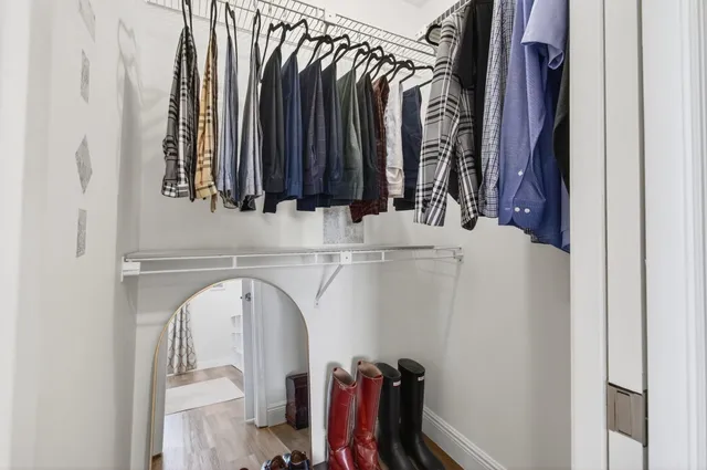 an aerial view of a house with a swimming pool patio and outdoor seating