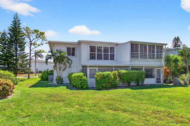 a view of a lake with a city