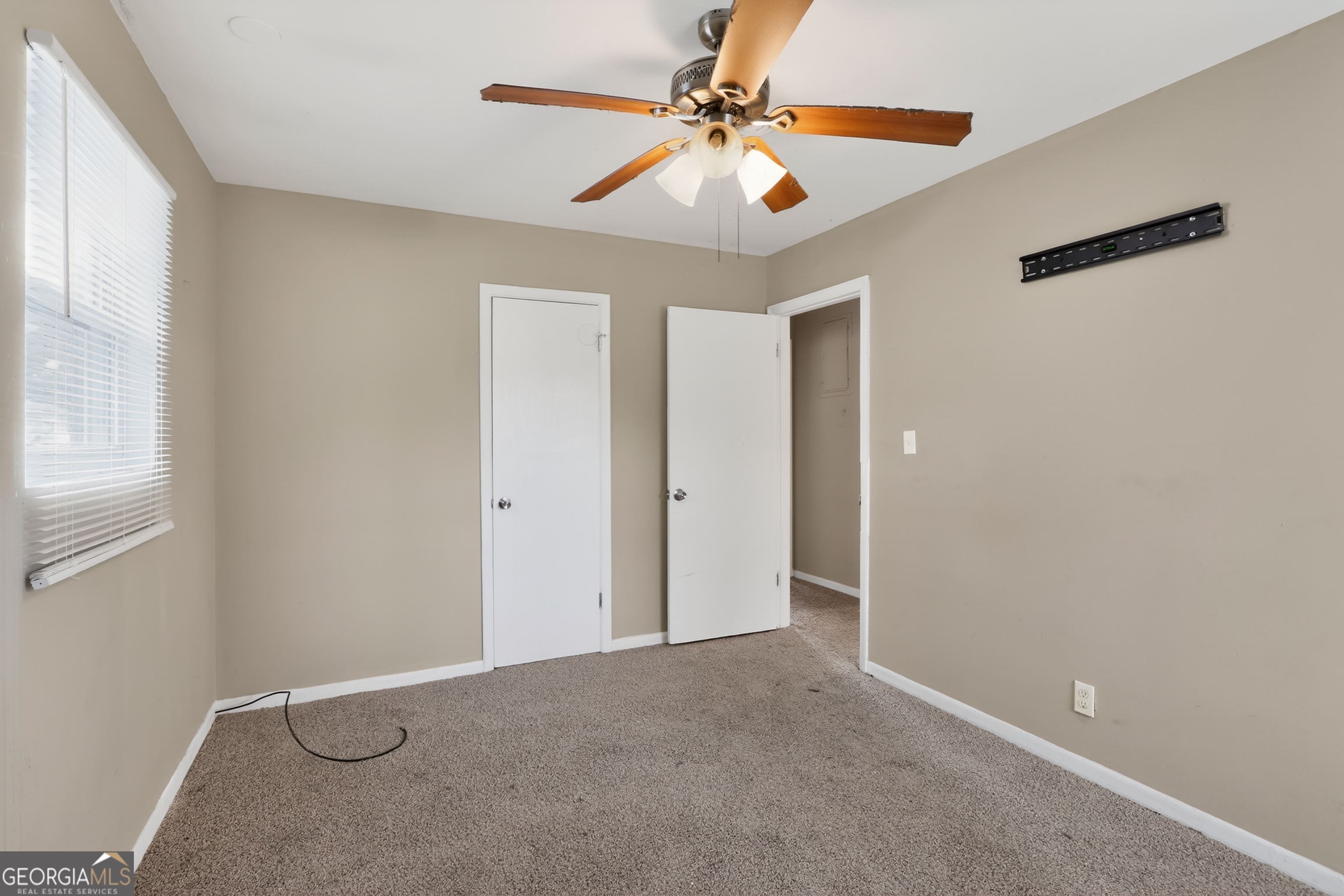 3606 Alene Circle Augusta, GA 30906 - Photo 23 of 30 an empty room with windows and fan