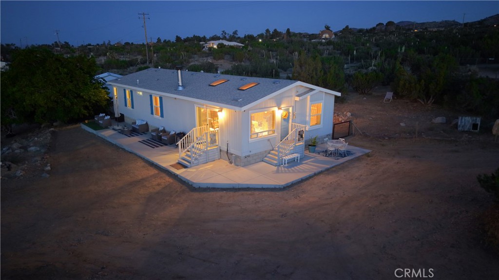 1330 Tamarack Road Pinon Hills, CA 92372 - Photo 1 of 19 a view of a house with a yard