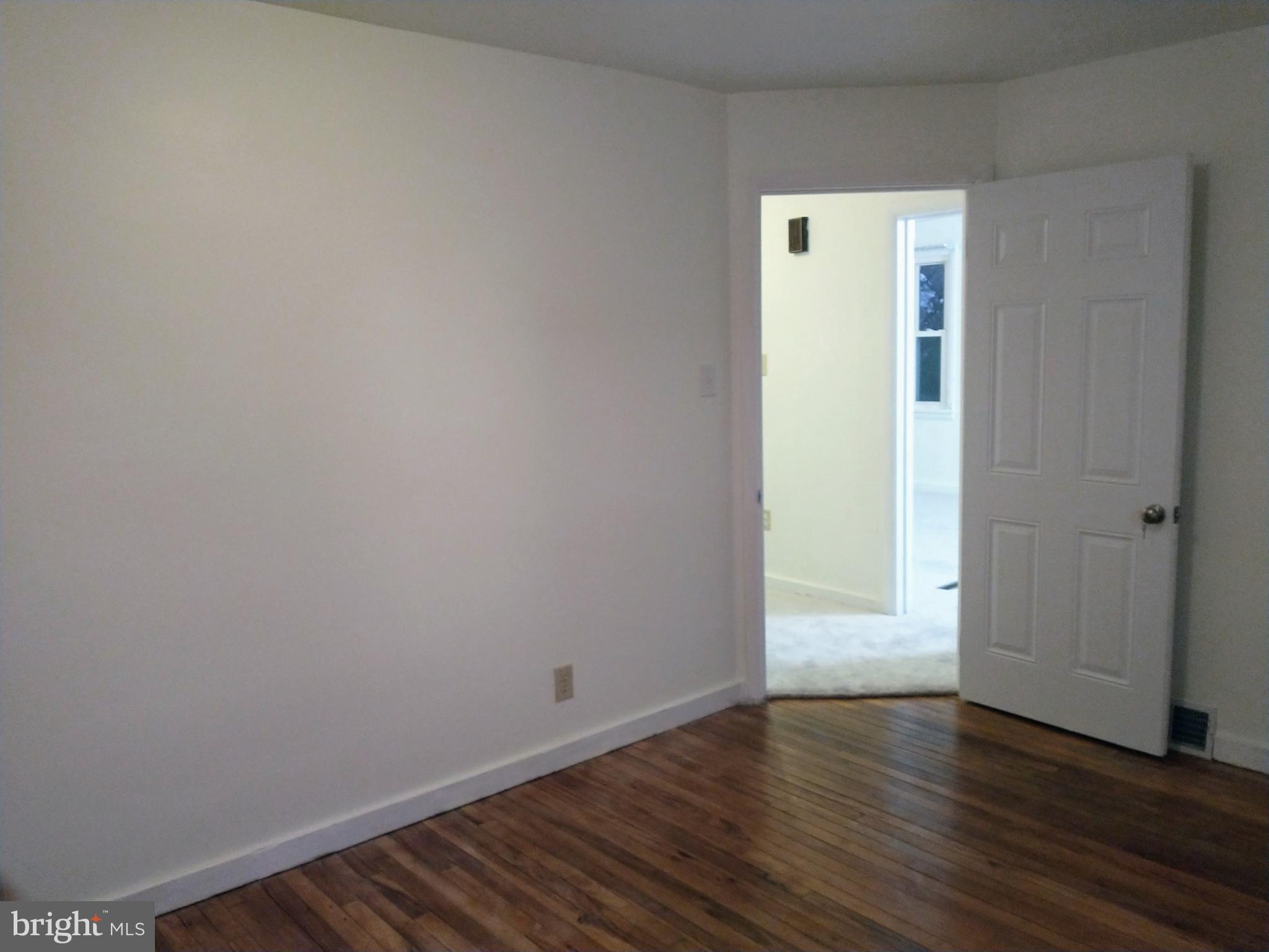 105 Monroe Street Reading, PA 19605 - Photo 15 of 41 FIRST FLOOR BEDROOM 13' X 13'