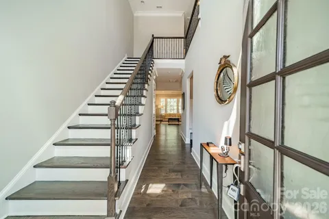 a view of entryway with wooden floor
