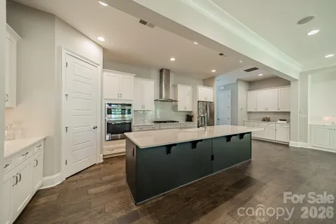 a large kitchen with cabinets