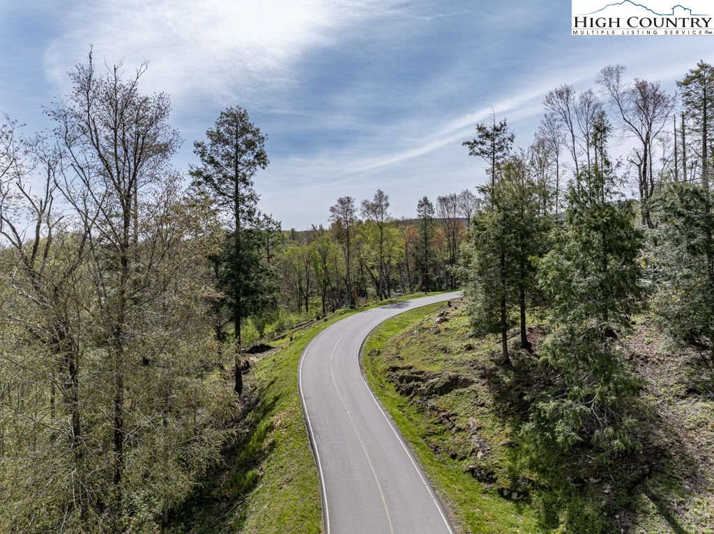 77 Eagles Nest Trail Banner Elk, NC 28604 - Photo 13 of 44 a view of a house with a yard