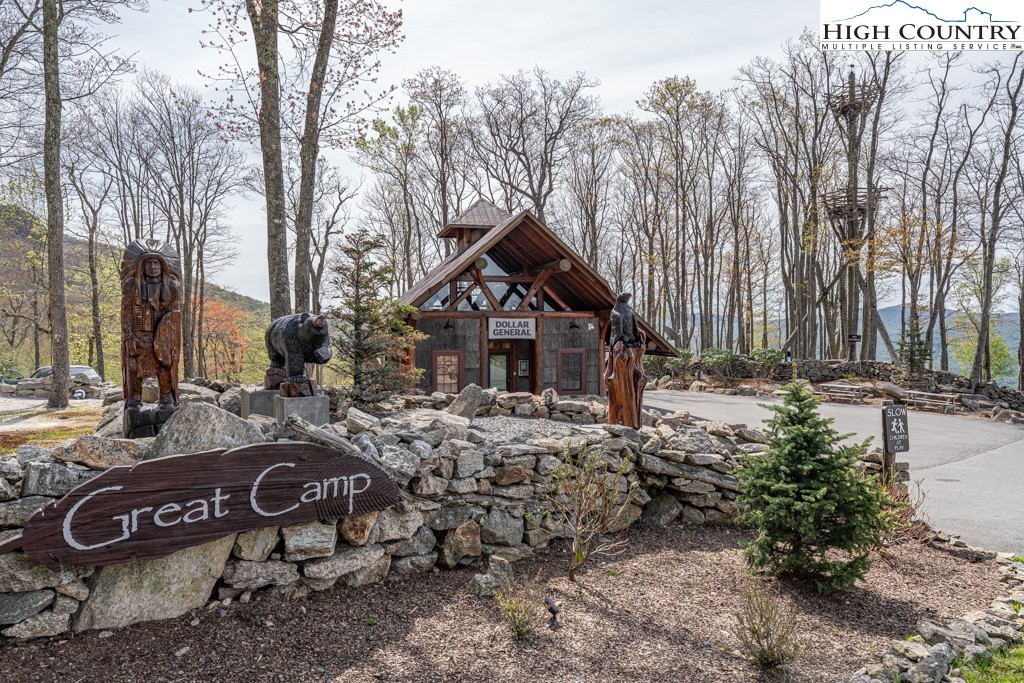 77 Eagles Nest Trail Banner Elk, NC 28604 - Photo 25 of 44 a front view of house with yard and seating area