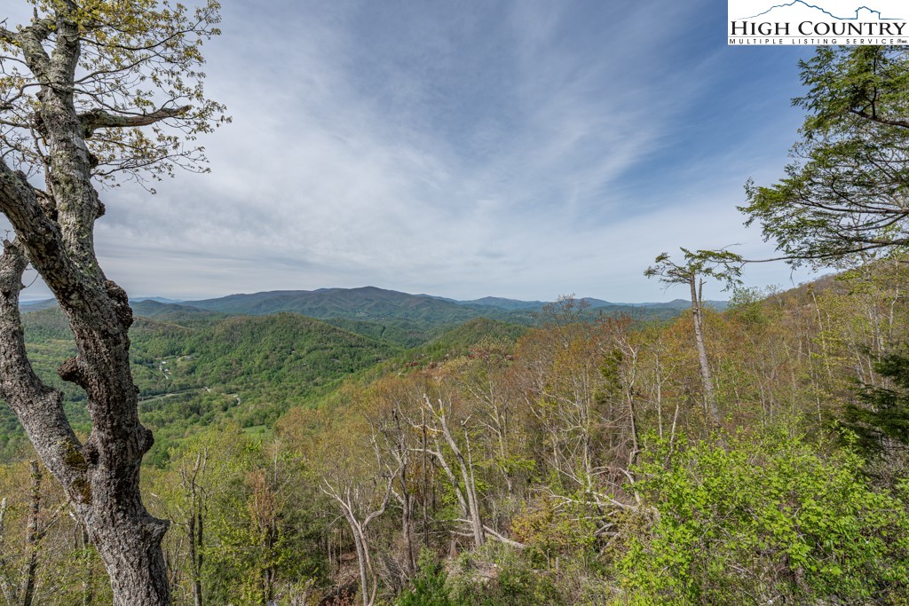 77 Eagles Nest Trail Banner Elk, NC 28604 - Photo 34 of 44 a view of a lake with a mountain in the back