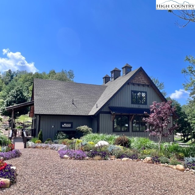 77 Eagles Nest Trail Banner Elk, NC 28604 - Photo 38 of 44 a view of a house with a street
