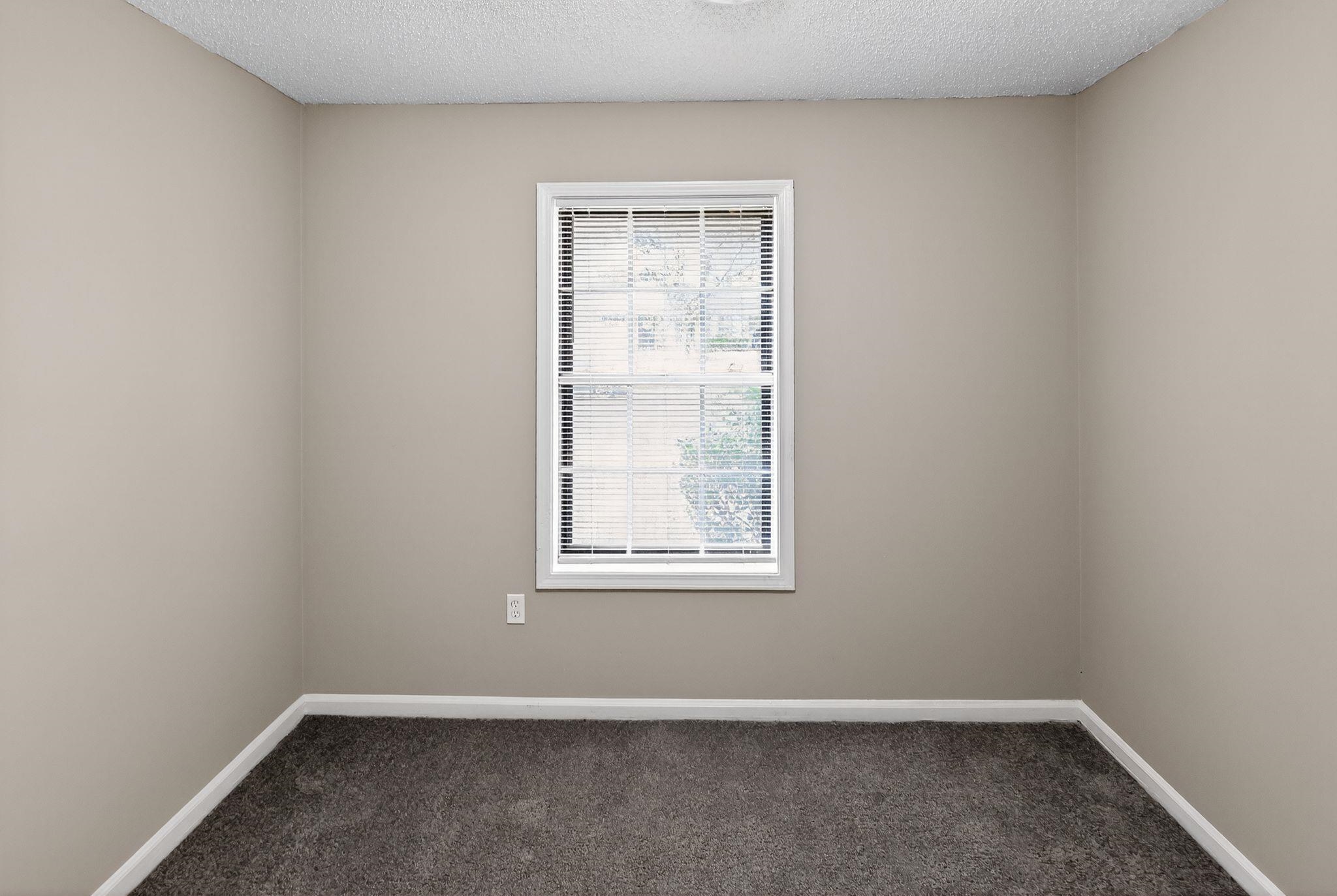 3860 Castleman Street Memphis, TN 38118 - Photo 13 of 30 an empty room with a window
