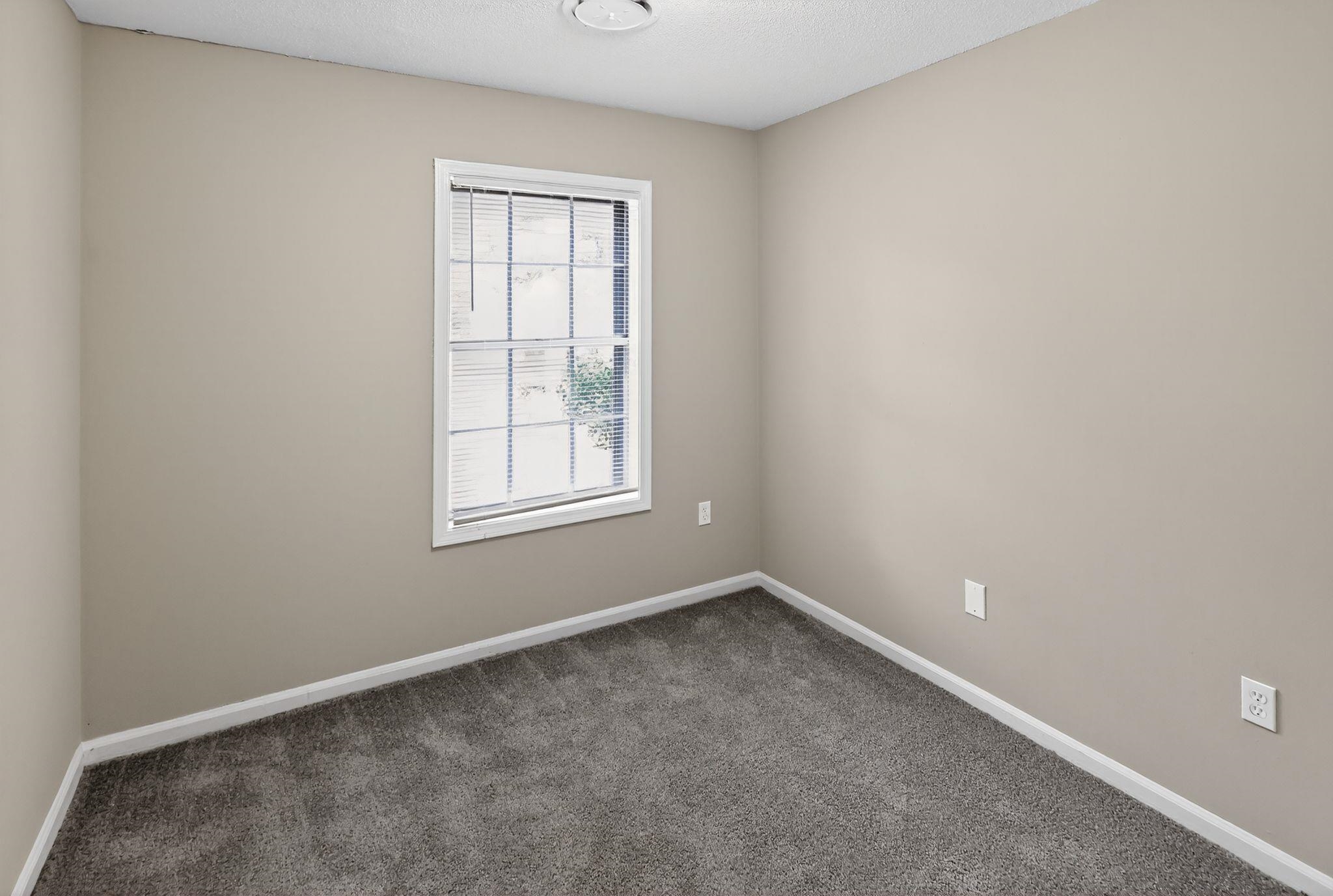 3860 Castleman Street Memphis, TN 38118 - Photo 14 of 30 an empty room with a window