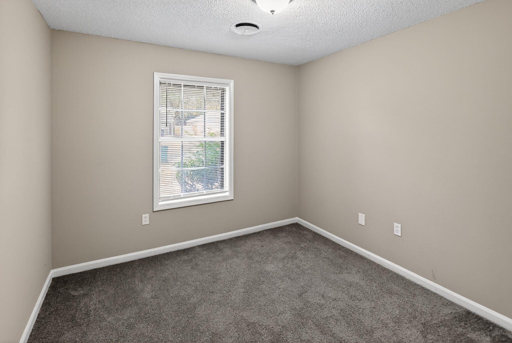 3860 Castleman Street Memphis, TN 38118 - Photo 15 of 30 a view of an empty room with a window