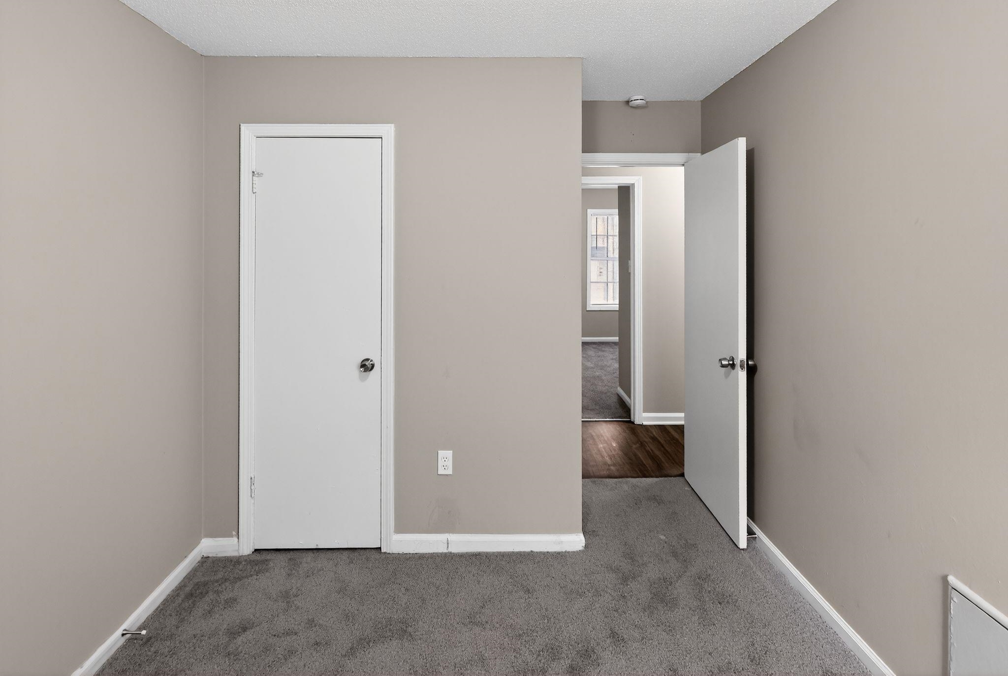 3860 Castleman Street Memphis, TN 38118 - Photo 21 of 30 an empty room with closet and windows