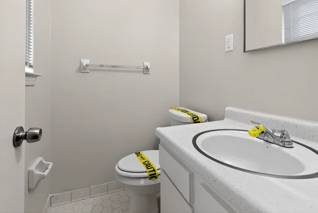 a bathroom with a sink and a toilet