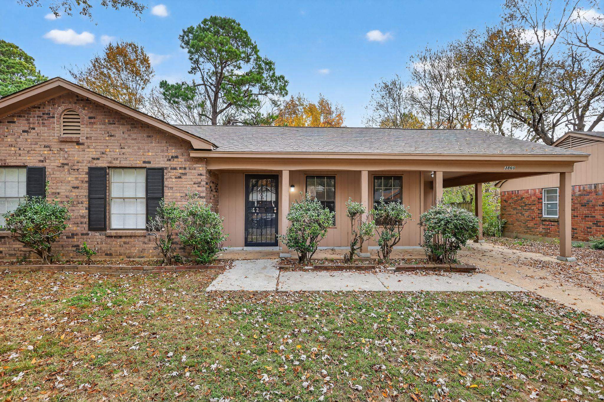3860 Castleman Street Memphis, TN 38118 - Photo 3 of 30 a front view of a house with garden