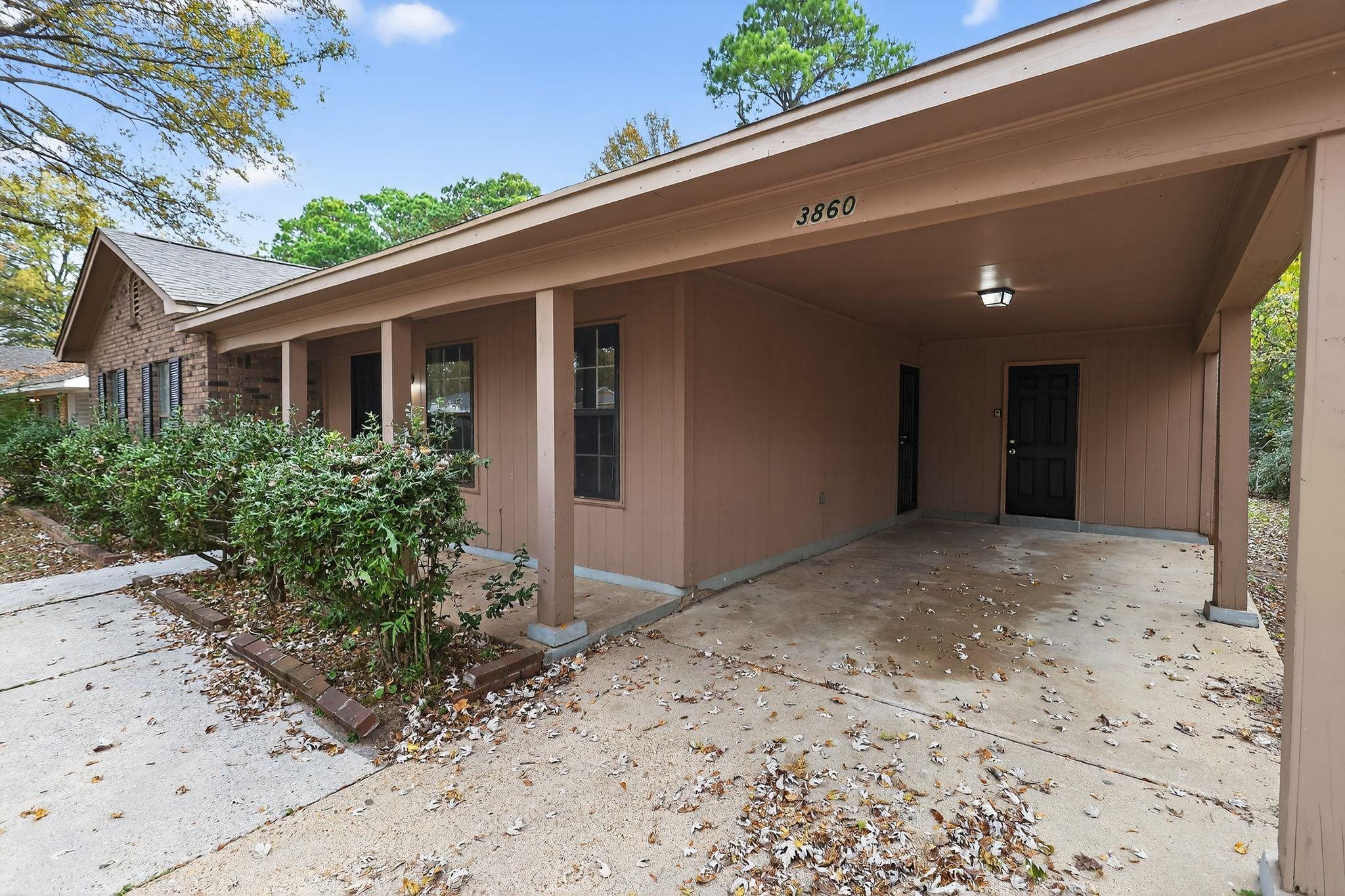 3860 Castleman Street Memphis, TN 38118 - Photo 5 of 30 a view of a front door and a yard