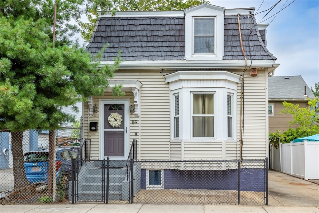 89 Prospect Street Somerville, MA 02143 - Photo 1 of 21 a front view of a house with garden