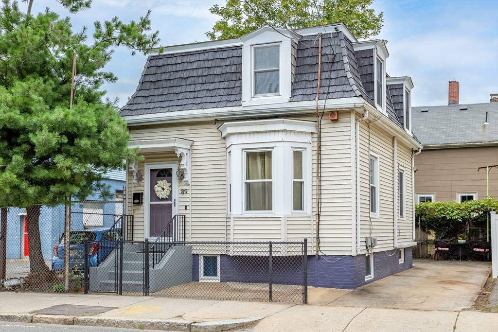 89 Prospect Street Somerville, MA 02143 - Photo 2 of 21 a view of a house with a patio