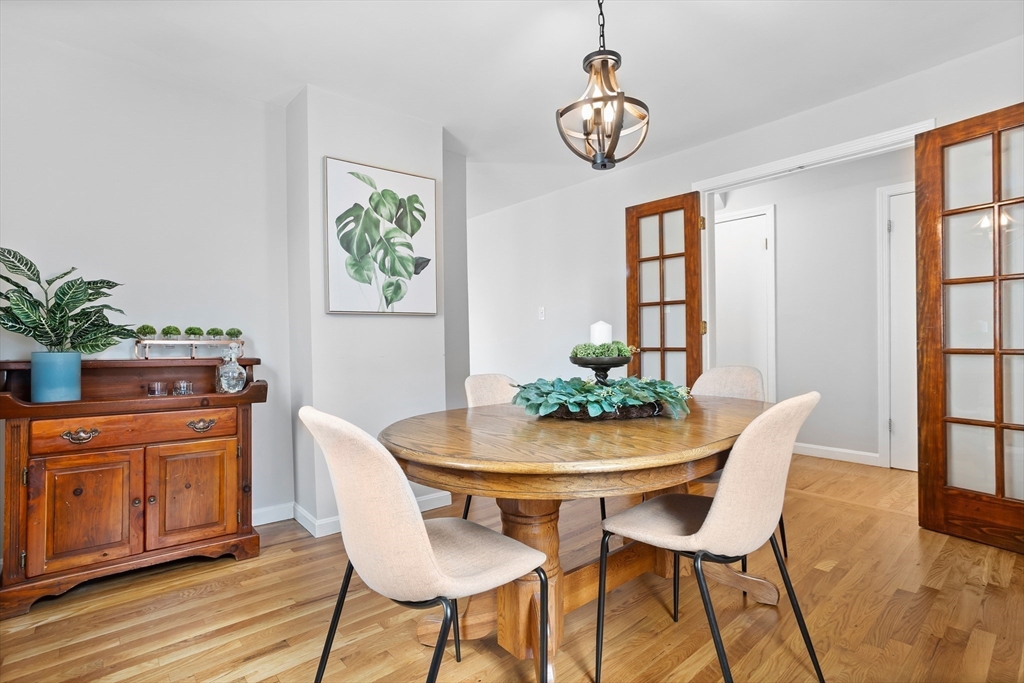 89 Prospect Street Somerville, MA 02143 - Photo 4 of 21 a view of a dining room with furniture and window